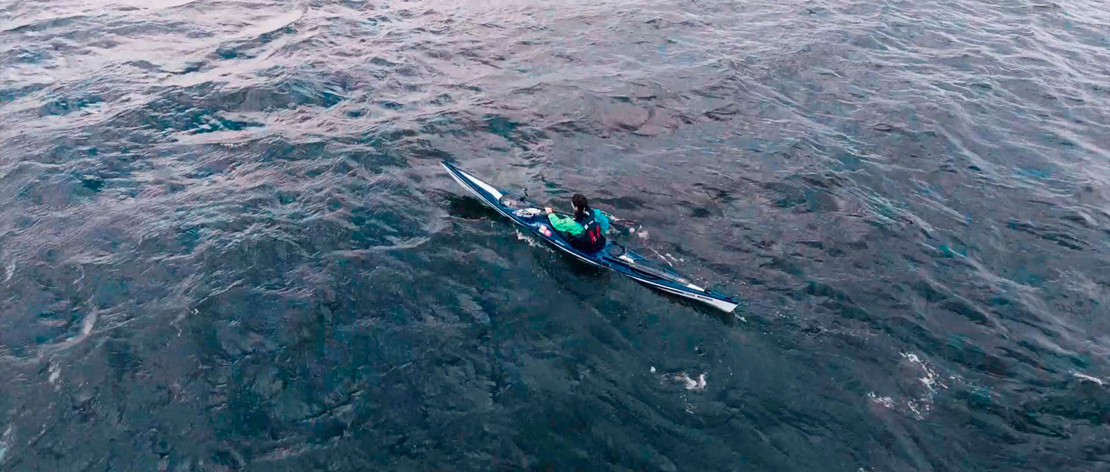 Sea Kayak on deep blue water.